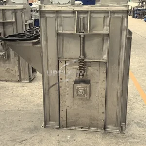 Plate chain bucket elevator with enclosed housing
