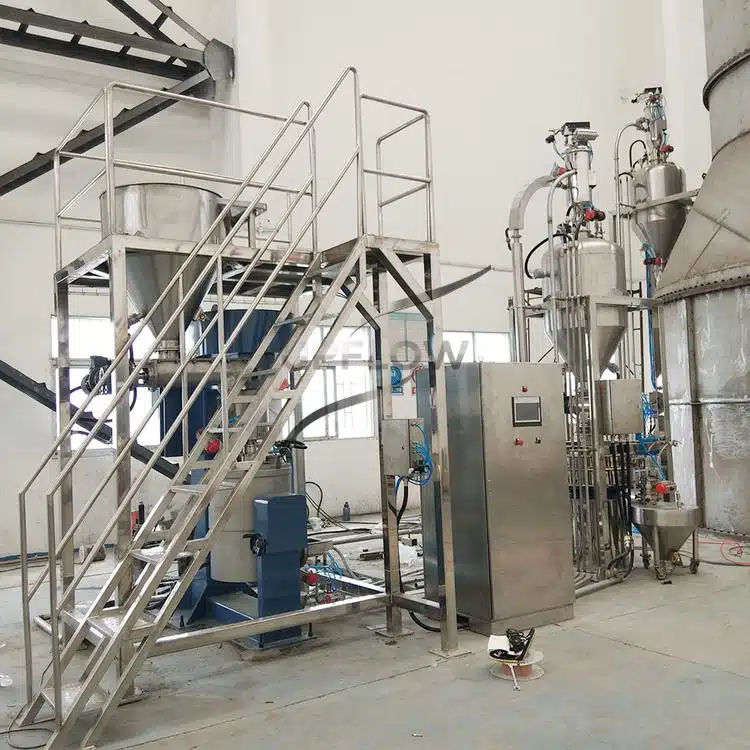 Vacuum feeder connected to mixing production line